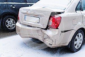 Car accident on the road in winter city