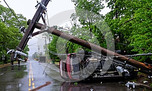 Car accident after a severe storm with crash electric pole