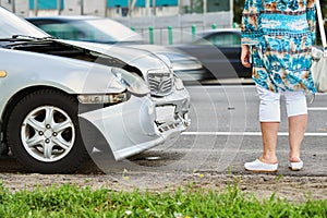 Car accident on street. damaged automobiles after crash in city