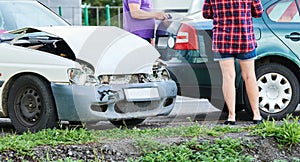 Car accident on street. damaged automobiles after crash in city