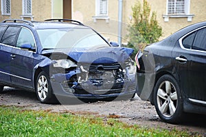 Car accident of  two cars with a broken front and rear