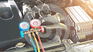 Car air conditioner check service, leak detection, fill refrigerant.Device and meter liquid cooling in the car by specialist