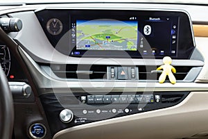 Car air conditioning button inside a car. Modern car climate control panel for driver and passenger with shallow depth