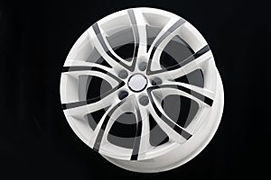 car alloy wheel, unusual white with black paint on the spokes. The disk for autotuning, beautiful