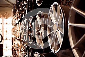 Car alloy wheels in a store, selective focus. Sale and replacement