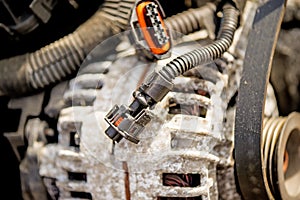 Car alternator on a scrap yard