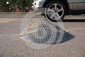 A car artificial unevenness to reduce speed on the road