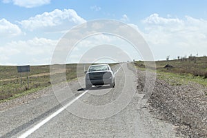 Car on the asphalt road
