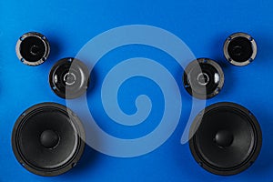 Car audio system. A set of speakers on a blue background