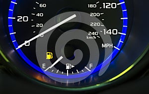Car auto dashboard gas fuel gauge indicating showing empty fuel tank out of gas