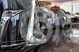 Car auto dealership. New cars at dealer showroom. Prestigious vehicles