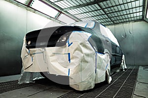 Car baking room Garage Car body work car auto car repair car paint after the accident during the spraying automotive