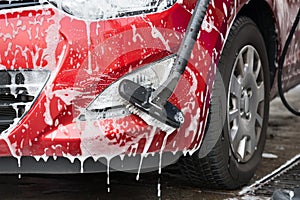 Car Being Washed By Scrubbing Brush