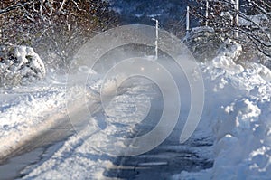 Car in blizzard in Bulgarian village