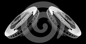 Car brake disc isolated on black background. Auto spare parts. Perforated brake disc rotor isolated on black. Braking ventilated