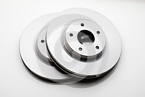 Car brake discs on white background