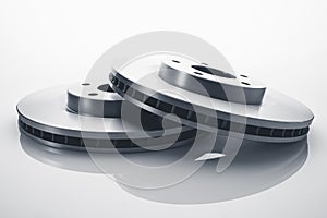 Car brake discs on white background