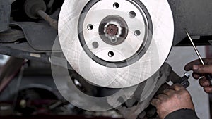 Car Brake Pads and Brake Disc Replacement In Car Repair Service