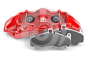 Car brakes. Red caliper and pads. Dsk braking system parts
