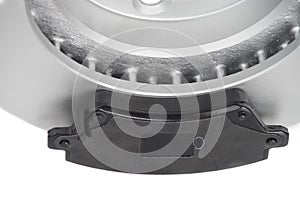 Car break pad and disk on white background
