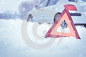 Car breakdown on snowy road