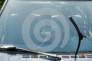 car with broken windshield close-up. road accident