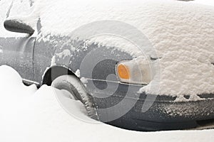 Car buried in deep snow