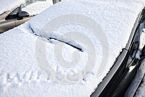 Car buried under snow