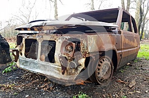 Car burned, abandoned and rusty