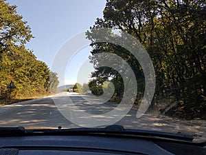 Car caravan on the road in spring moving