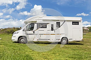 Car caravan sea spring green blue sky