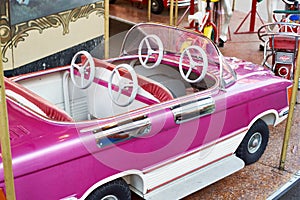 Car on the carousel at the fair