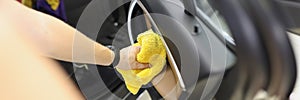 Car cleaner that cleans car door panel with microfiber cloth