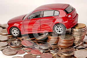 Car on coins background : Car loan, Finance, saving money, insurance and leasing