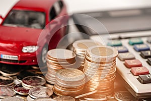 Car on coins background : Car loan, Finance, saving money, insurance and leasing