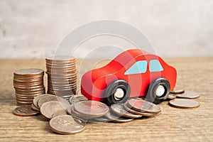 Car and coins, Car loan, Finance, saving money, insurance and leasing time concepts