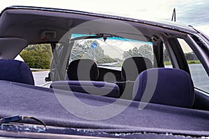 Car after a collision with a heavy truck