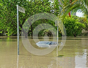 A car is almost completely submerged in the 2010-11 Brisbane floods