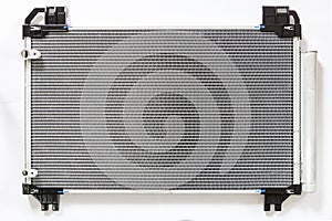 Car condenser radiator on white background. Radiator top view of