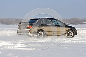 Car cornering spray snow