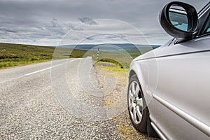 Car by country road