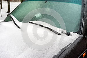 Car covered with ice after freezing rain