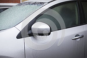 Car covered with ice, winter