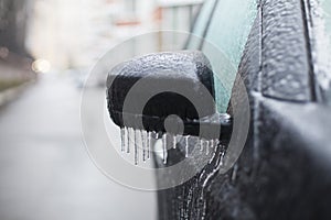 Car covered with ice, winter
