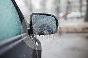 Car covered with ice, winter