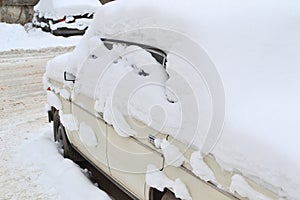 Car covered with snow