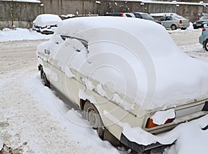 Car covered with snow