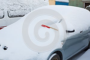 Car covered with snow. Winter concept