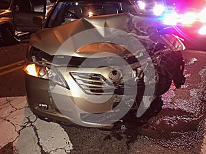 Car crash accident at intersection on street.