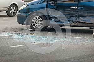 Car crash accident on street, damaged automobiles after collision in city